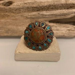 Brass ring with stone inlay